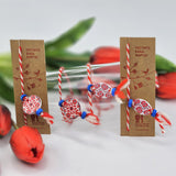 Комплект мартеници за ръка с шевица, синьо мънисто и малко пискюлче - 2 бр.