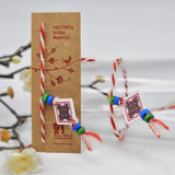 Мартеница за ръка с мотив шевица и ромбовидно мънисто в синьо