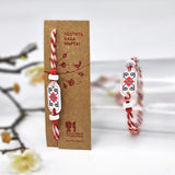 Мартеница за ръка с мотив шевица с бели и червени мъниста - малка